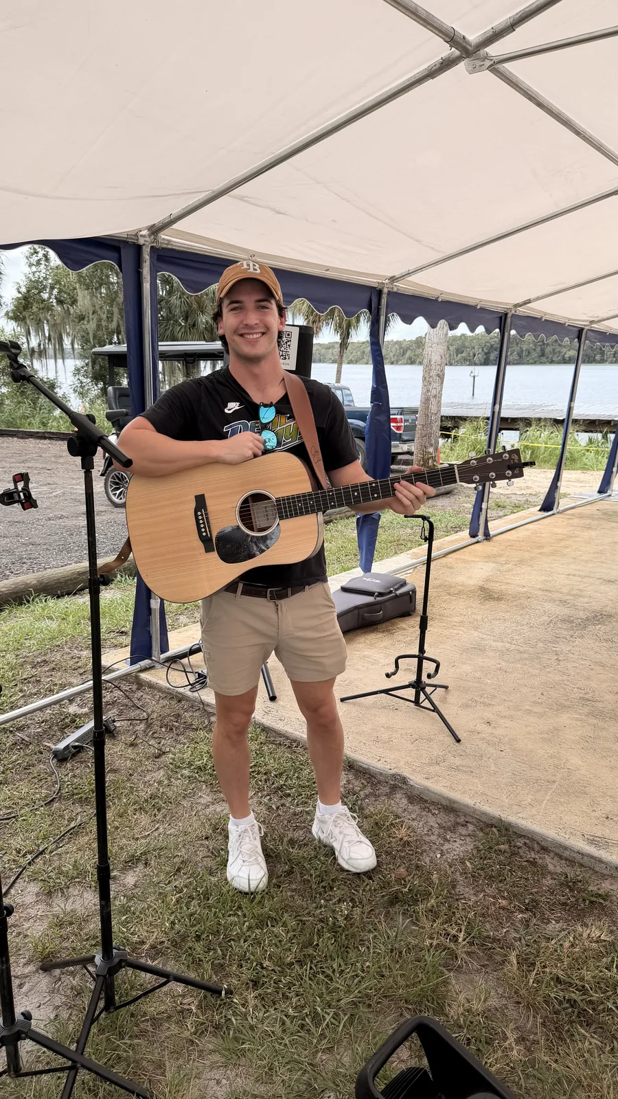 Colby Coldiron playing live music under a tent at Cartoberfest in Welaka