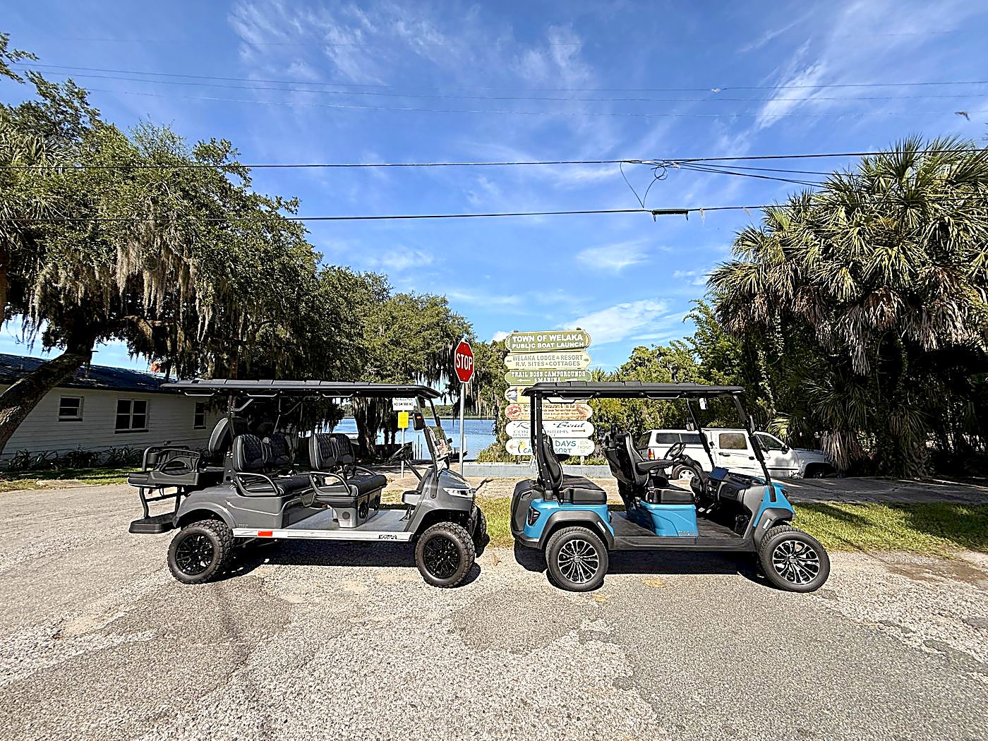 Welaka golf carts under the oaks in town