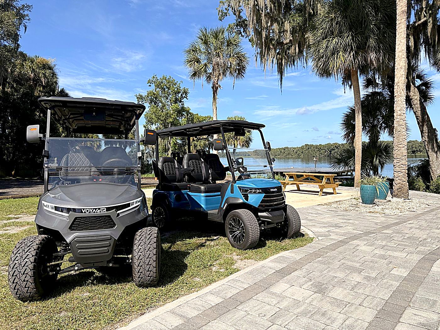 Both golf carts on the riverfront path in Welaka