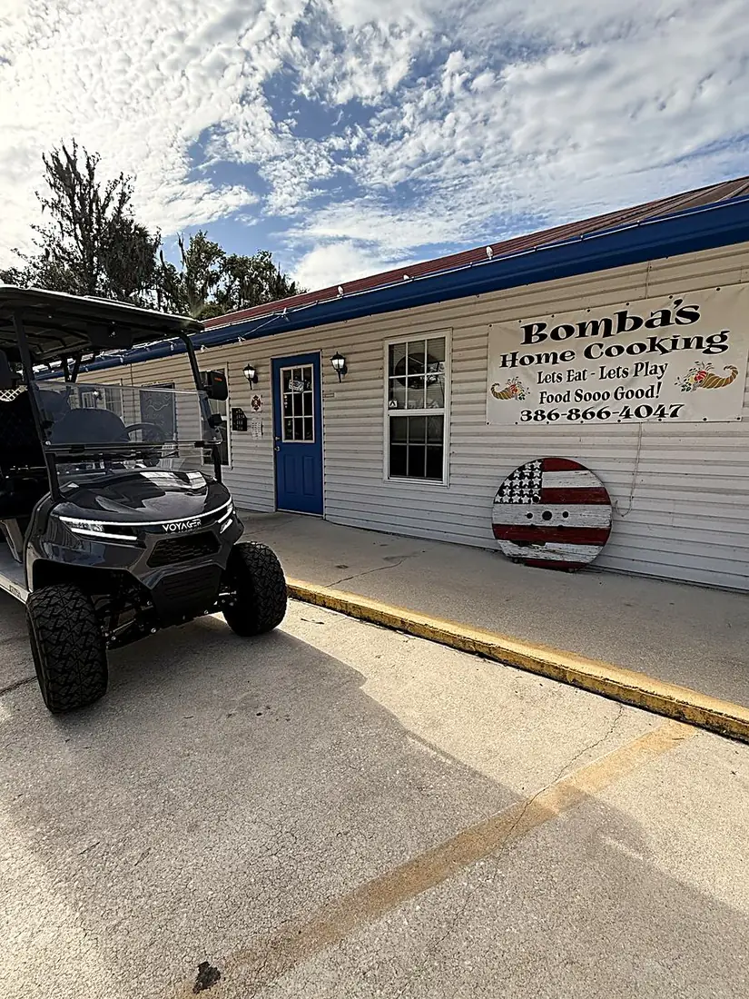 Golf cart at Bomba's Home Cooking restaurant in Welaka, Florida