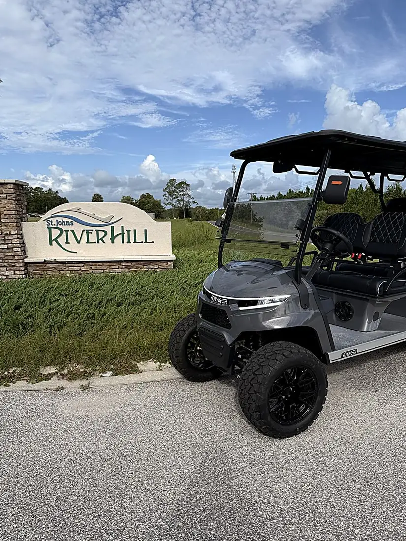 Golf cart at the River Hill entrance in Welaka, Florida